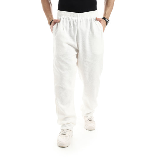 بنطلون أنيق بخصر مطاطي أبيض سادة