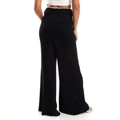 Jamila Women Solid Pattern Flare Fit Pants